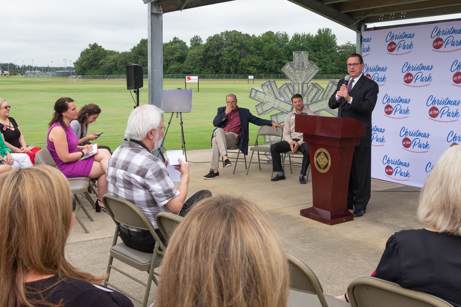 Mayor Harold Perrin speaks at Christmas at the Park press conference held at Joe Mack Campbell Park.