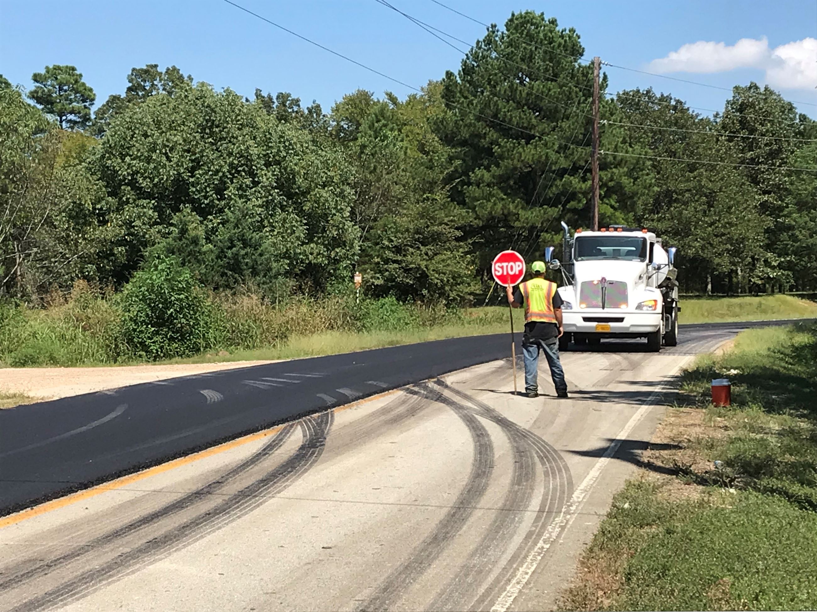 Workers working on Keller's Chapel Road.