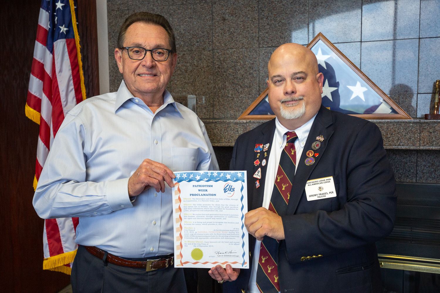 Mayor Perrin and American Chairman of Jonesboro Elks Lodge Jeremy Frakes, PER hold the Patriotism We