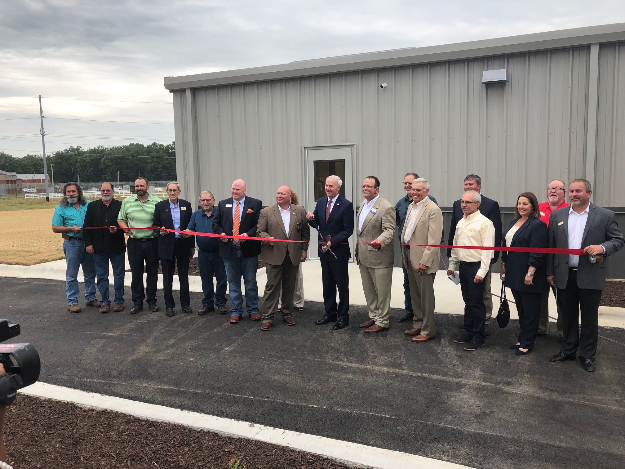 Governor Hutchinson with other officials including Mayor Perrin about to cut the ribbon for Craighea