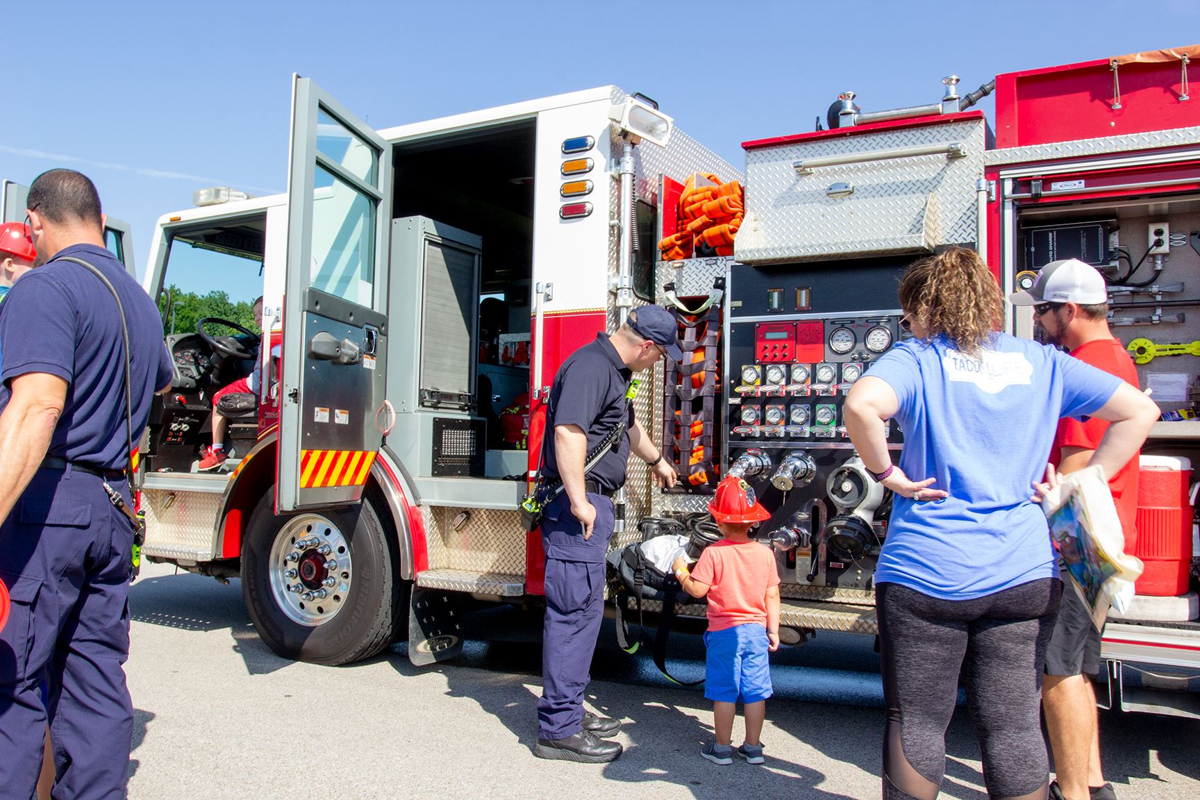 Fireman teaching at Touch-A-Truck