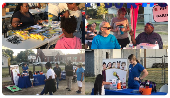 Police, kids, vendors, Councilman Dr. Charles Coleman, and other people enjoying National Night Out.