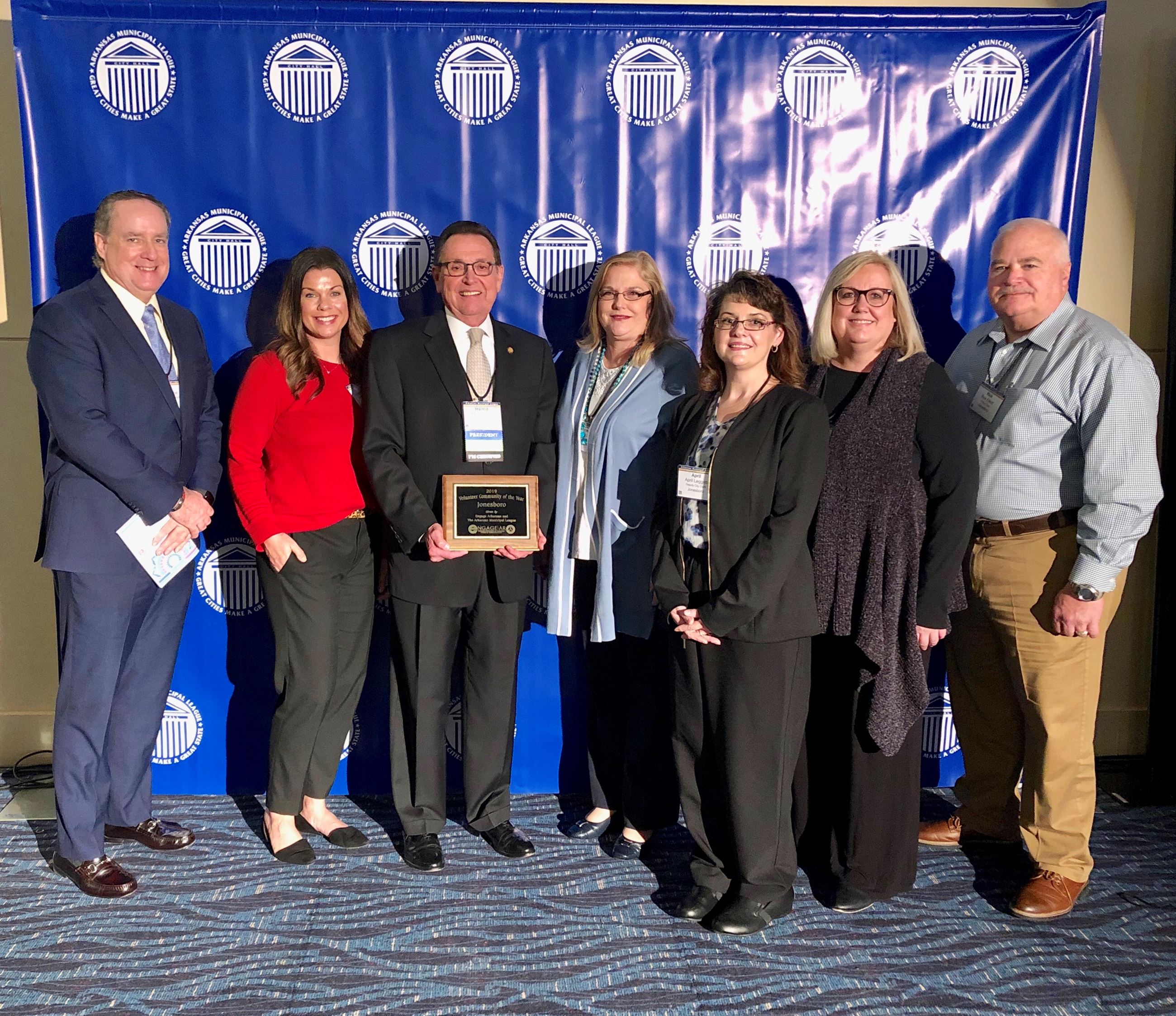 Mayor Perrin and staff pose with Arkansas Volunteer Community of the Year award