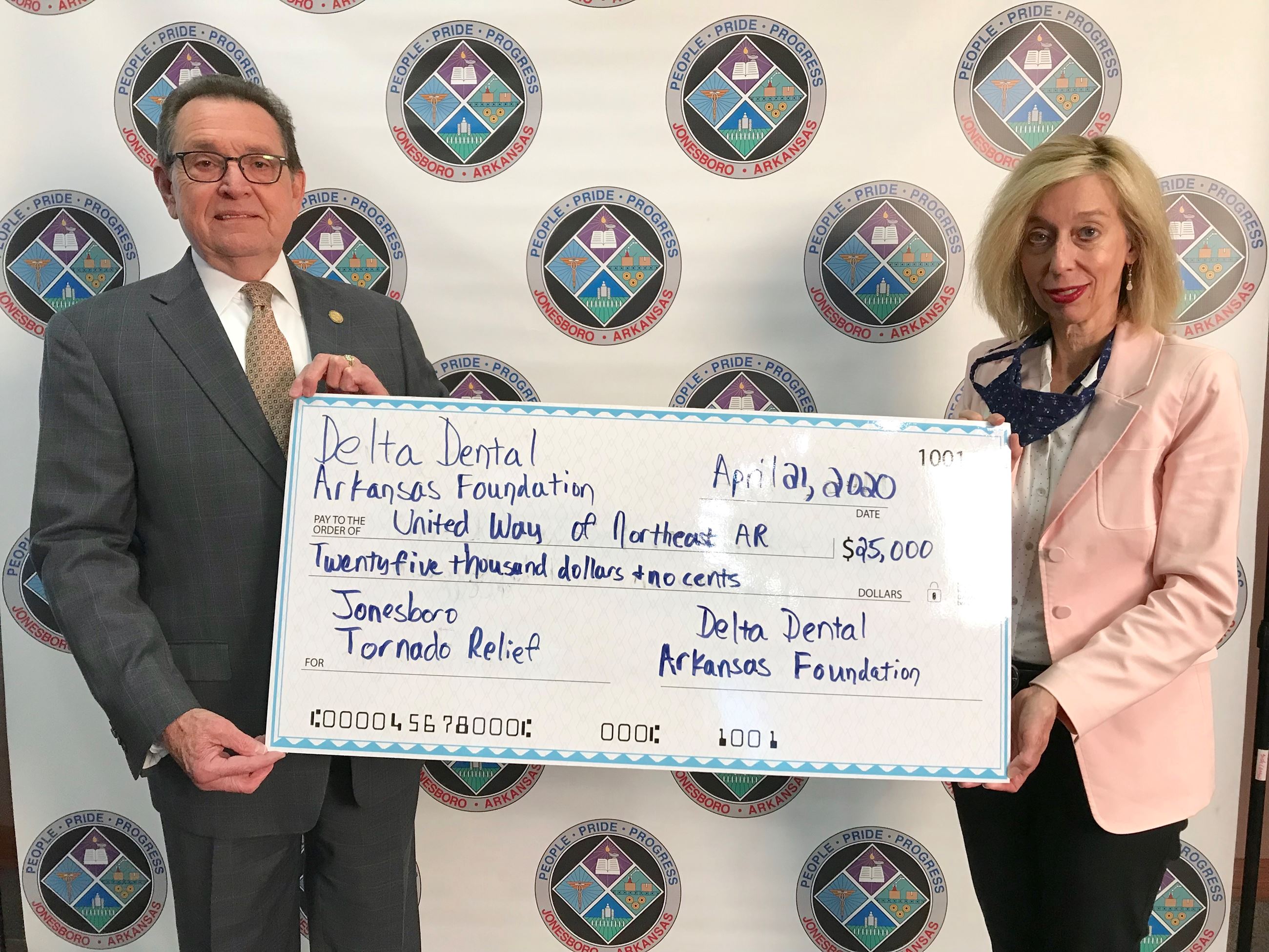 Mayor Harold Perrin and United Way of Northeast Arkansas Executive Director Nanette Heard hold a lar