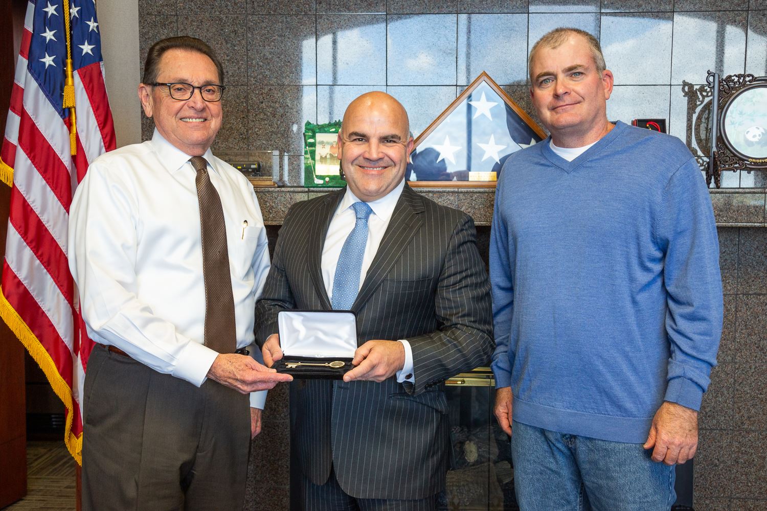 Mayor Perrin and Councilman Moore with Clay Young holding key to the city