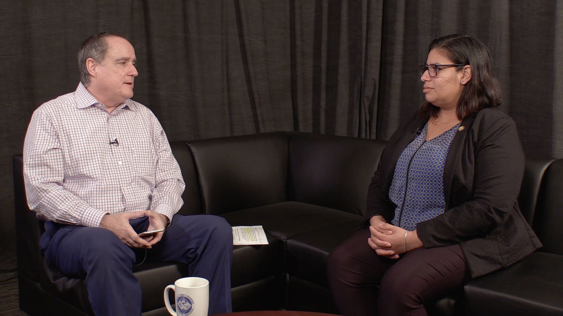 Host Bill Campbell talking to Angy Abaunza on Let's Talk, Jonesboro