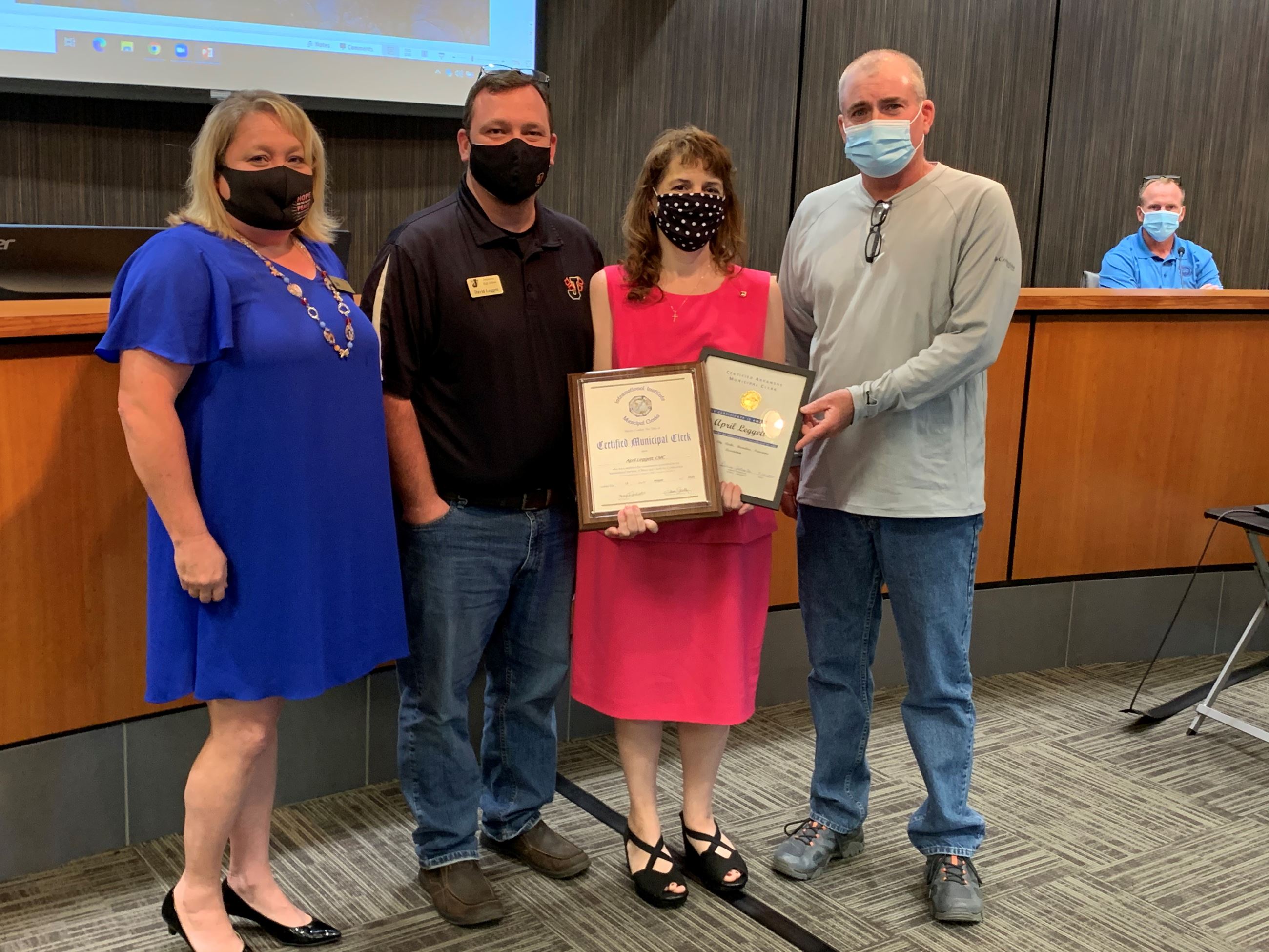 Deputy City Clerk April Leggett with her certifications