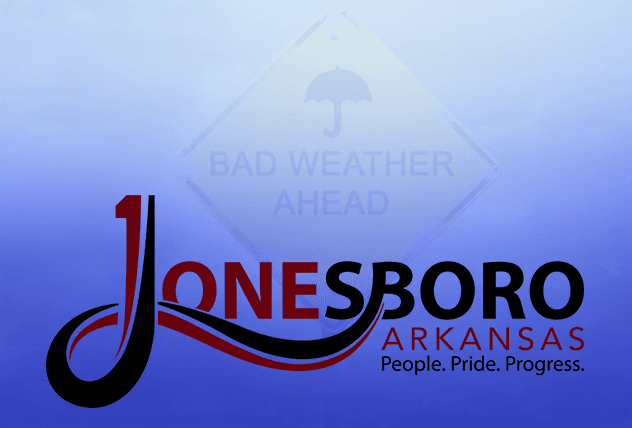 Warning sign that reads Bad Weather Ahead and words Jonesboro Arkansas below