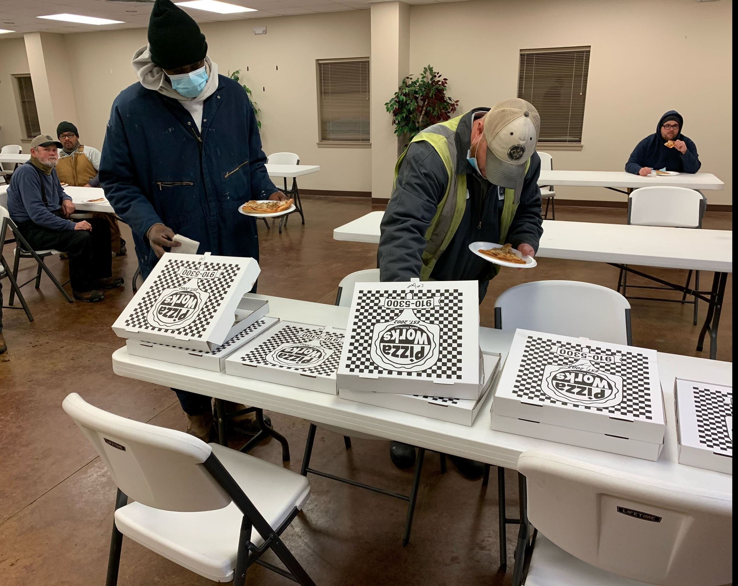 City workers getting pizza