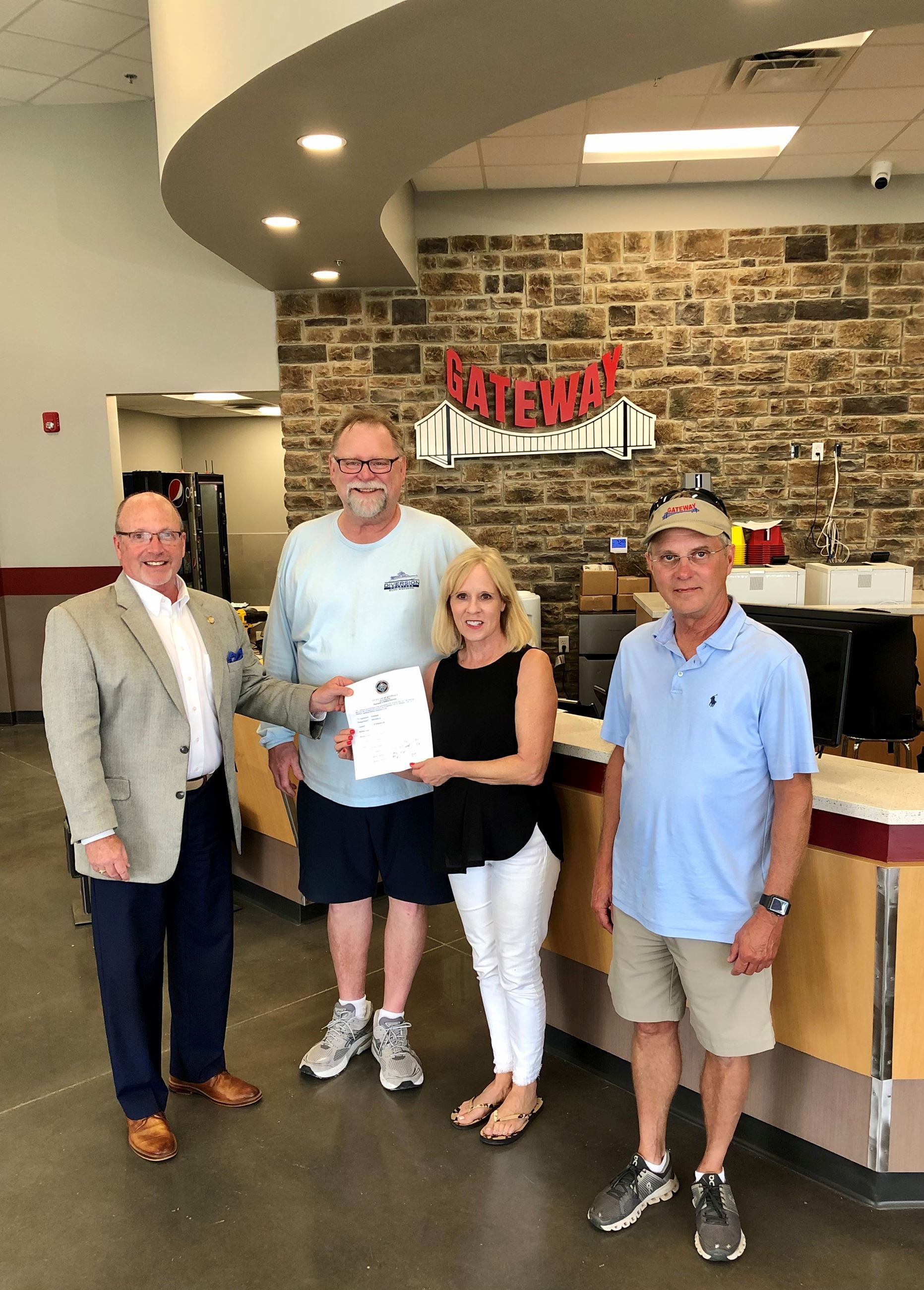 Mayor Copenhaver with Gateway Tire staff