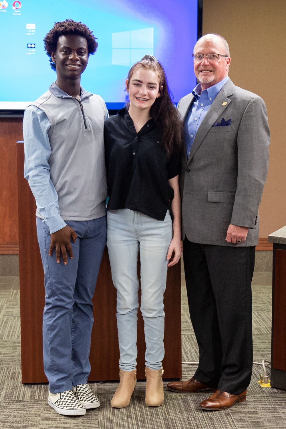 Zavian Collins, Hannah Lawrence, and Mayor Copenhaver posing together for the photo