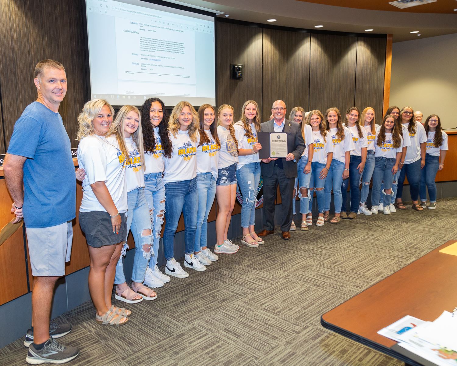 The Valley View High School Lady Blazers Softball Team standing together with Mayor Copenhaver