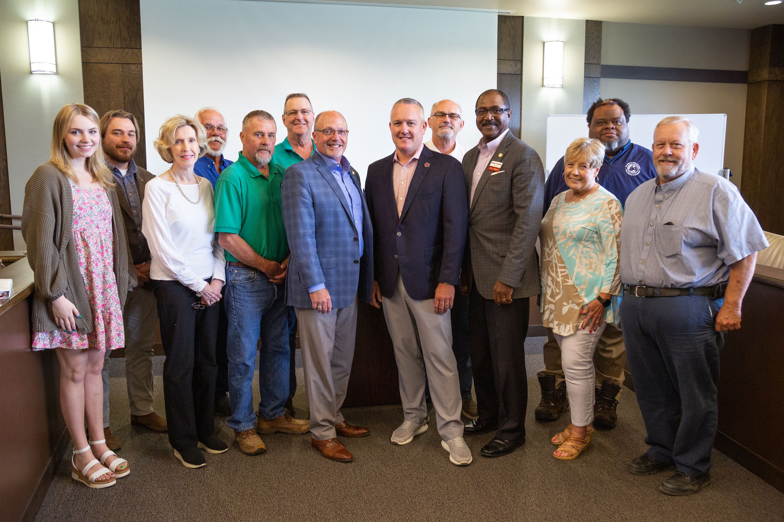 Jeff Purinton with NEA Mayors Caucus members standing posed for camera