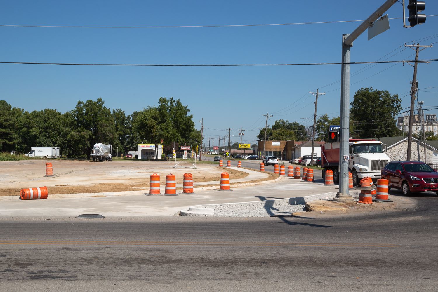Turning lane and sidewalk (partially built) at the Gee and Washington intersection