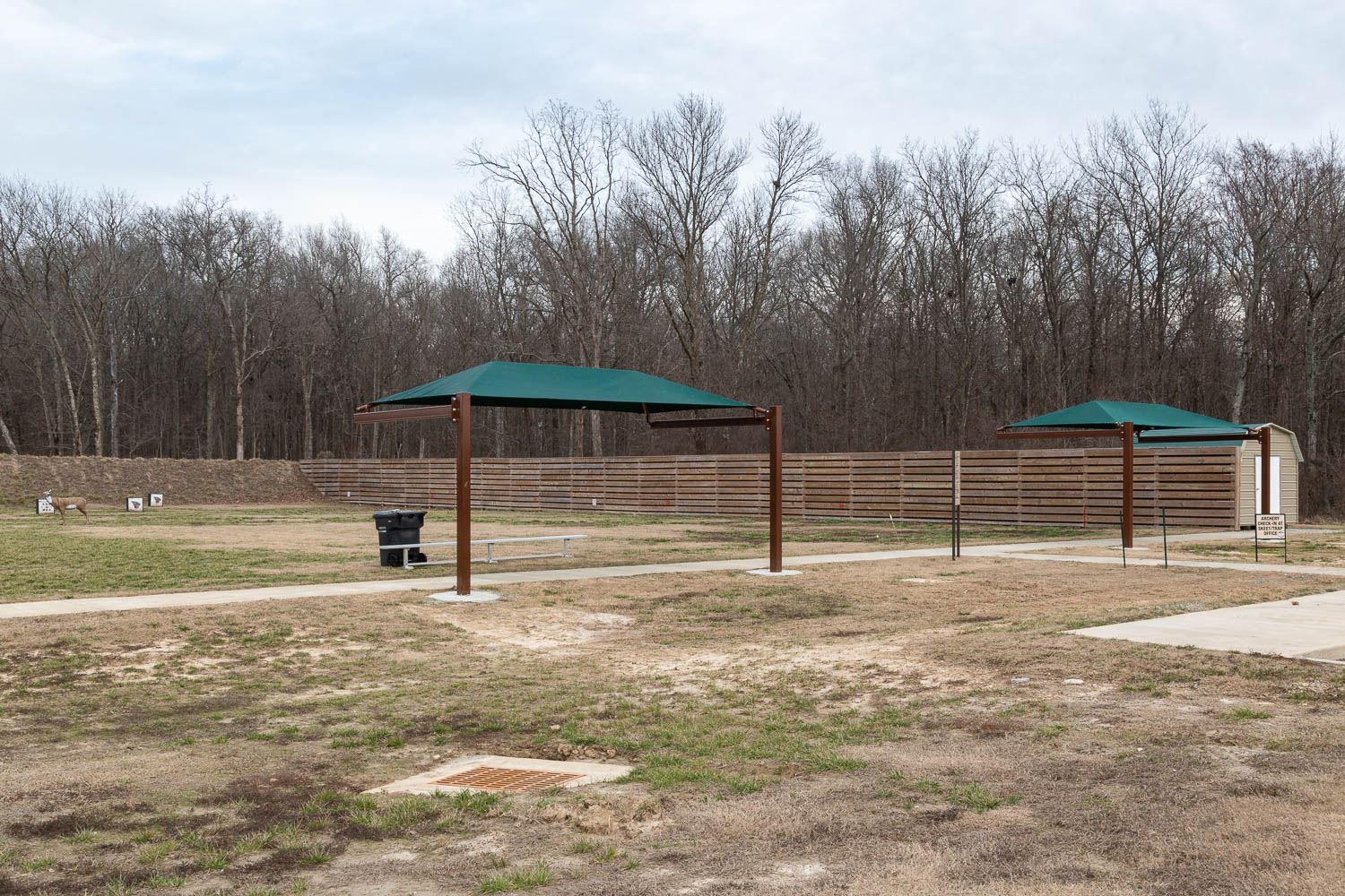 Two shade canopies at the archery range