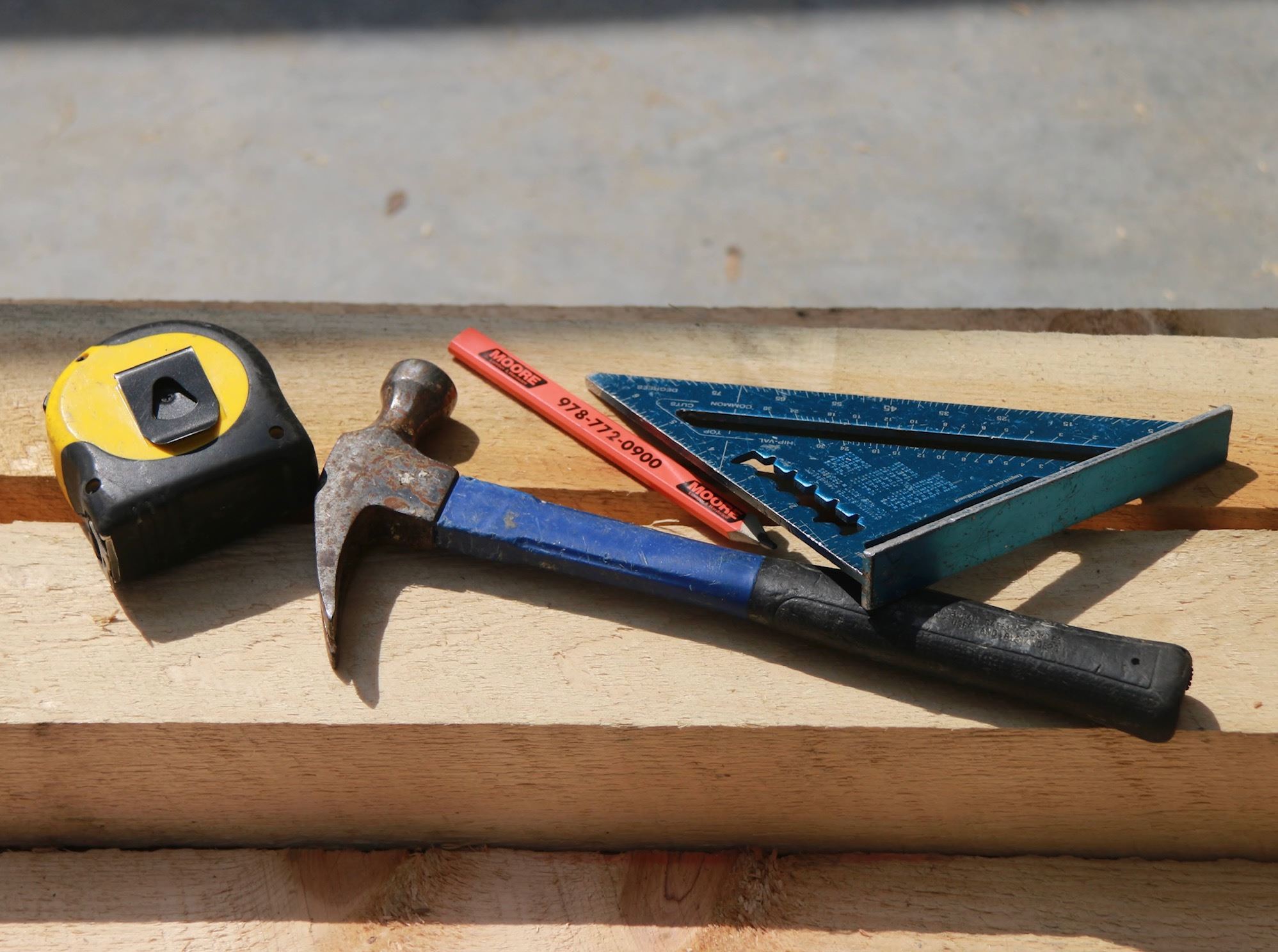 Hammer, tape measure and other carpentry tools