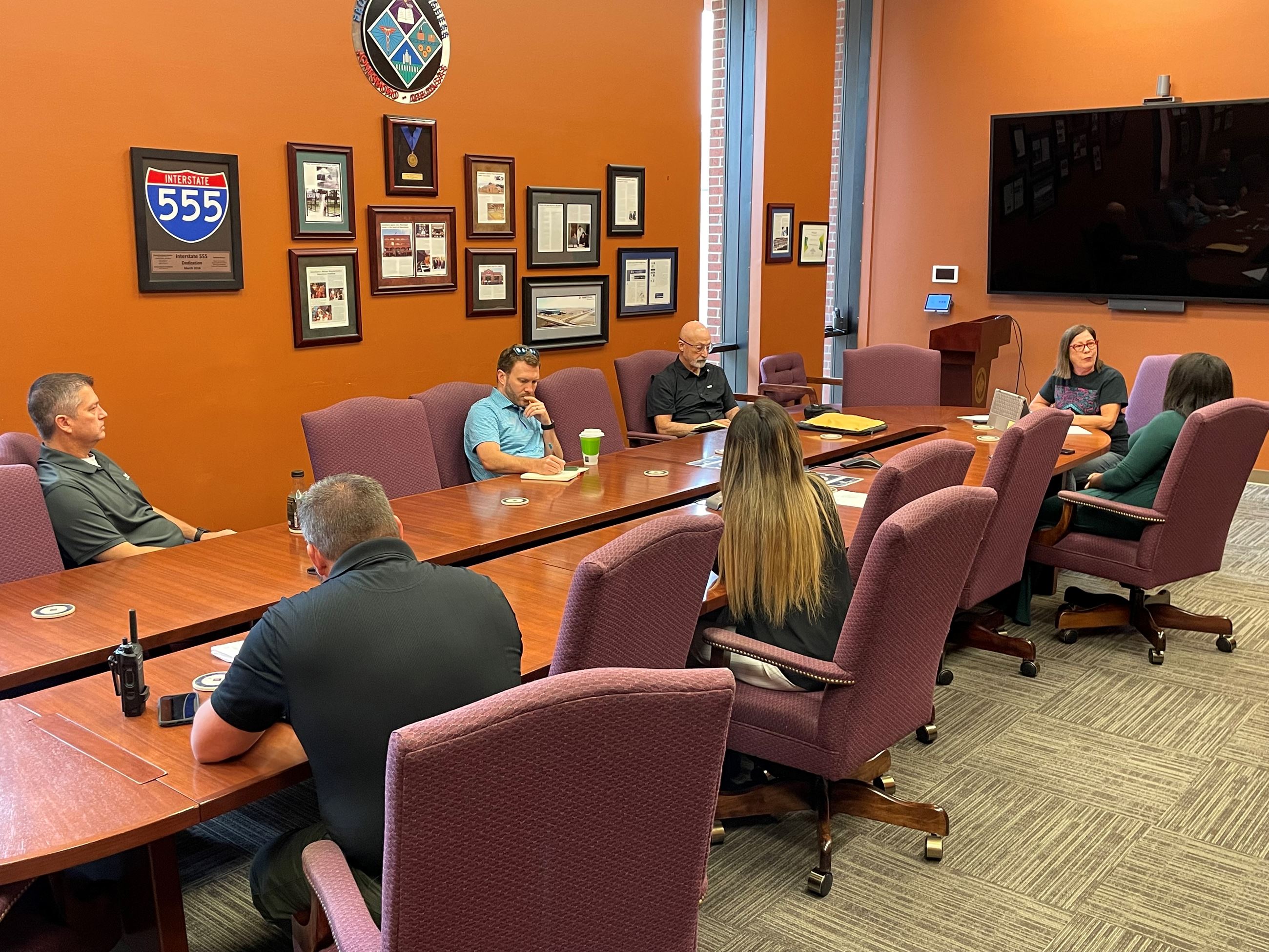 Eclipse Committee members sitting at board room table