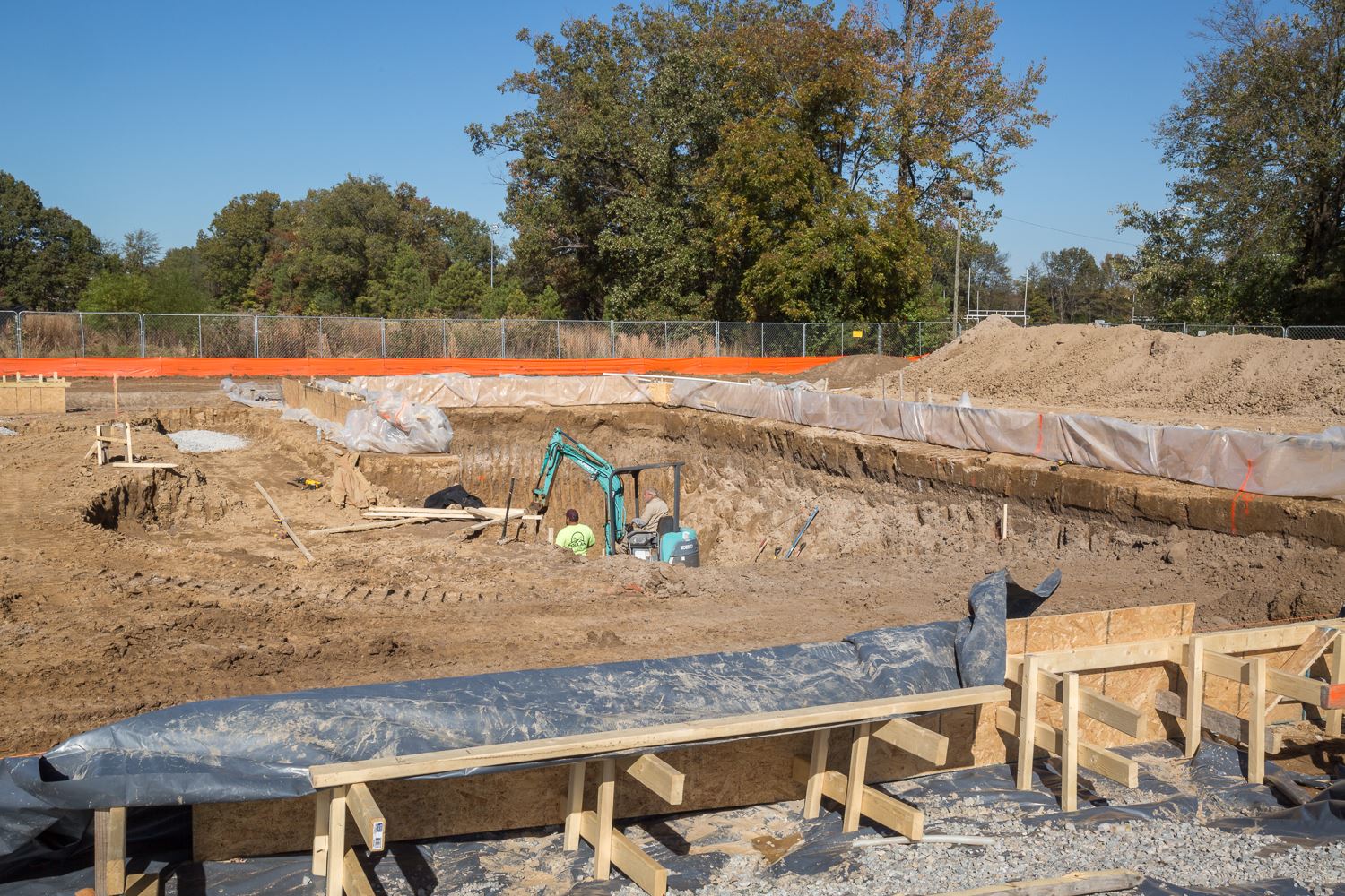 Workers digging out swimming pool at Parker Park